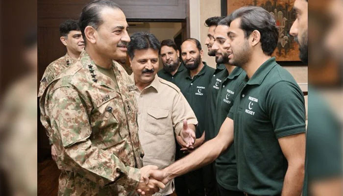 Chief of Army Staff (COAS) General Syed Asim Munir (left) recieves Pakistan Hockey team at the General Headquarters in Rawalpindi on May 17, 2024. — ISPR