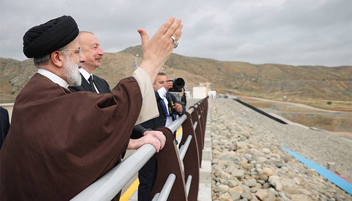 Iranian President Ebrahim Raisi and Azerbaijans President Ilham Aliyev visit the Qiz-Qalasi dam on the Azerbaijan-Iran border, May 19, 2024. — Reuters
