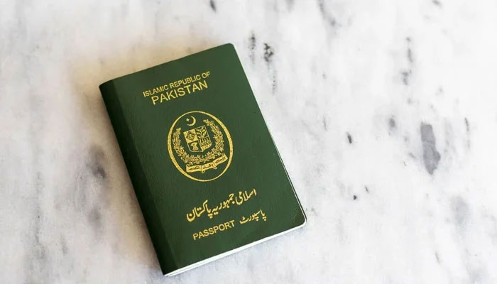 An undated photograph of the Pakistani passport. — X/@visafoto_com
