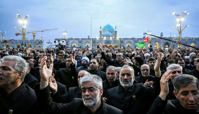 Mourners attend a burial ceremony of late Iranian President Ebrahim Raisi in the holy shrine of Imam Reza in Mashhad, Iran, May 23, 2024. — Reuters