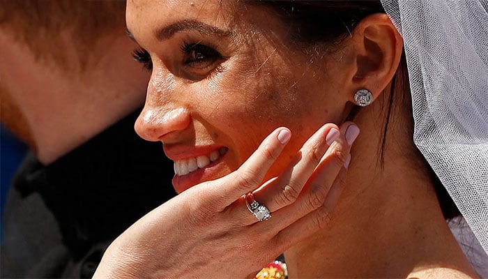 Meghan Markle sparkles with reappearance of tri-stone engagement ring at Invictus games.