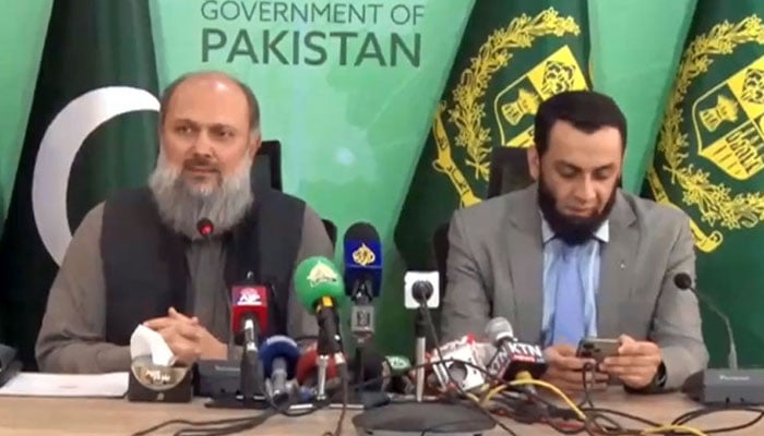 Federal Minister for Commerce Jam Kamal (left) and Information Minister Ataullah Tarar address a press conference in Islamabad on May 24, 2024. — Radio Pakistan