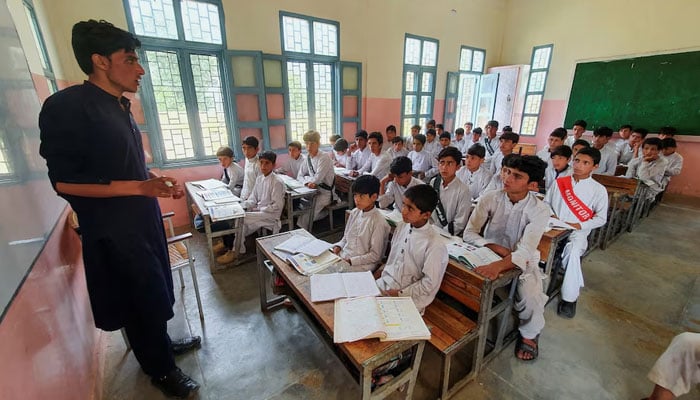 Students attend a class at a school in Battagram, Khyber Pakhtunkhwa. — Reuters/File