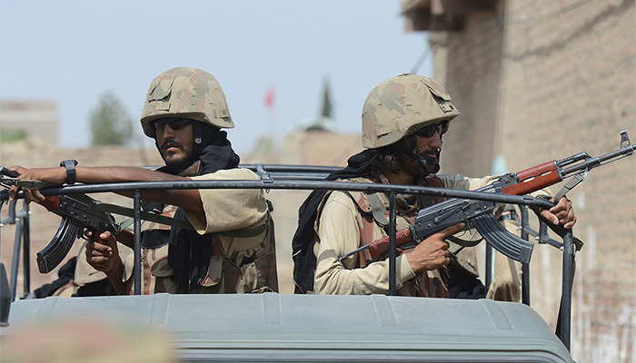 Pakistan Army soldiers patrol during a military operation against Taliban militants, in the main town of Miranshah in North Waziristan, July 9, 2014.— AFP