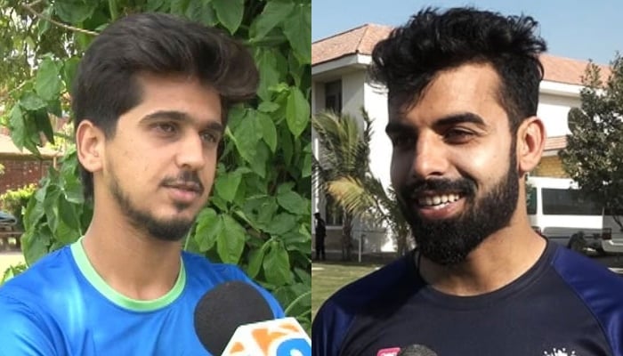 Pakistani cricketers Saim Ayub (left) and Shadab Khan seen while conversing with Geo News in these stills taken from a video. — Geo News