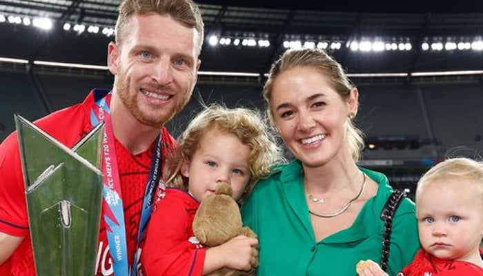 England captain Jos Buttler pictured with his wife and two children. — England Cricket/File
