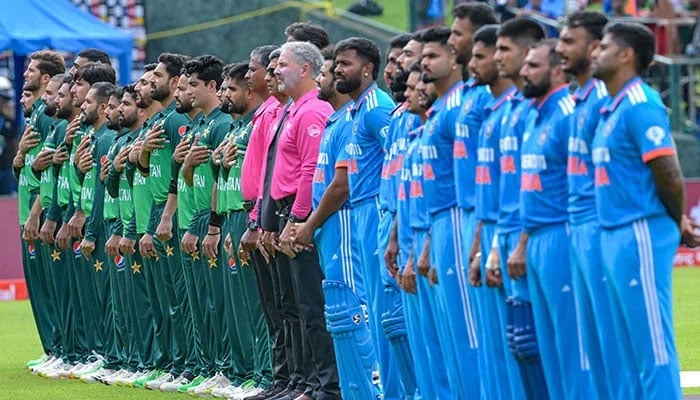 Pakistani and Indian players stand for national anthems before the start of the Asia Cup 2023 ODI match at the Pallekele International Cricket Stadium in Kandy on September 2, 2023. — AFP