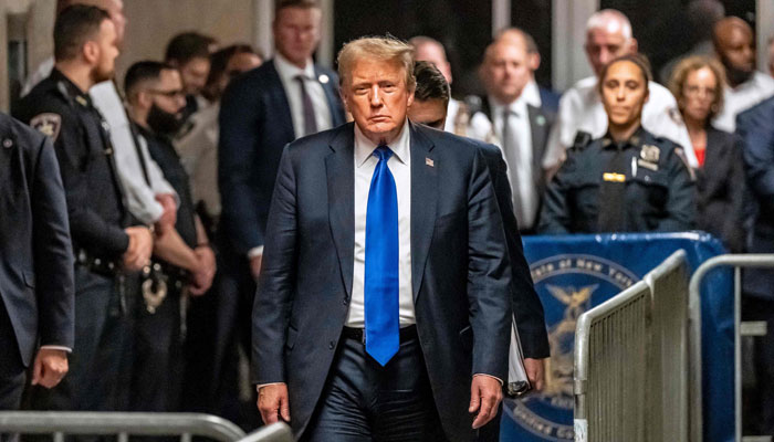 Former US President and Republican presidential candidate Donald Trump walks to speak to the press after he was convicted in his criminal trial at Manhattan Criminal Court in New York City, on May 30, 2024. — AFP