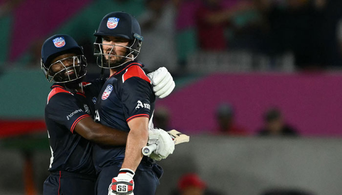 USAs vice-captain Aaron Jones and Andries Gous celebrate during the ICC men´s Twenty20 World Cup 2024 at the Grand Prairie Cricket Stadium in Grand Prairie, Texas on June 1, 2024 — AFP