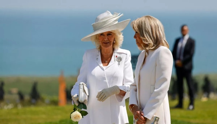 Queen Camilla was captured alongside Brigitte Macron during a D-Day memorial service in Normandy