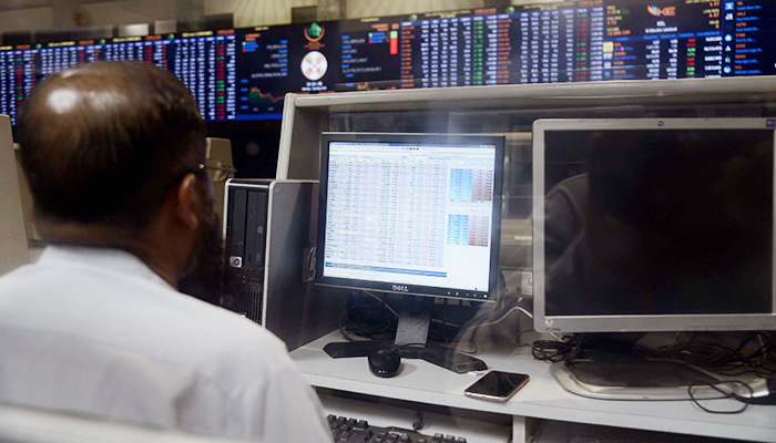 A broker talks on the phone at the Pakistan Stock Exchange in Karachi on May 20, 2024. — PPI