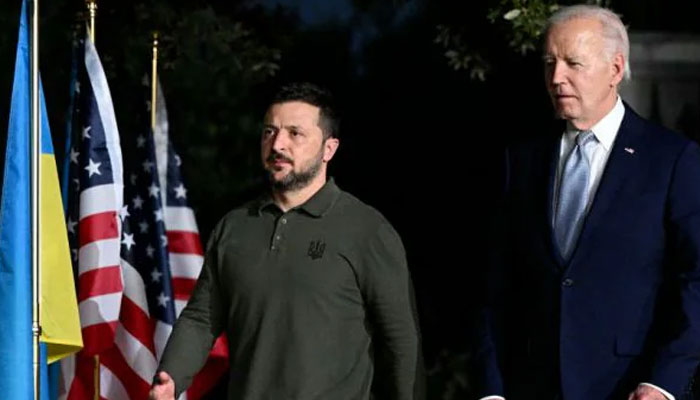 US President Joe Biden and Ukrainian President Volodymyr Zelensky arrive to give a press conference at the Masseria San Domenico on the sidelines of the G7 Summit hosted by Italy in Apulia region, on June 13, 2024 in Savelletri. — AFP