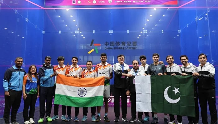 Pakistan and Indias team pose for a group photo before their match on June 14, 2024, in China. — Photo by author