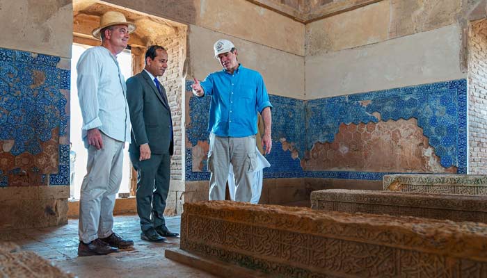 US envoy Andrew Schofer gestures at Makli Necropolis. — Supplied