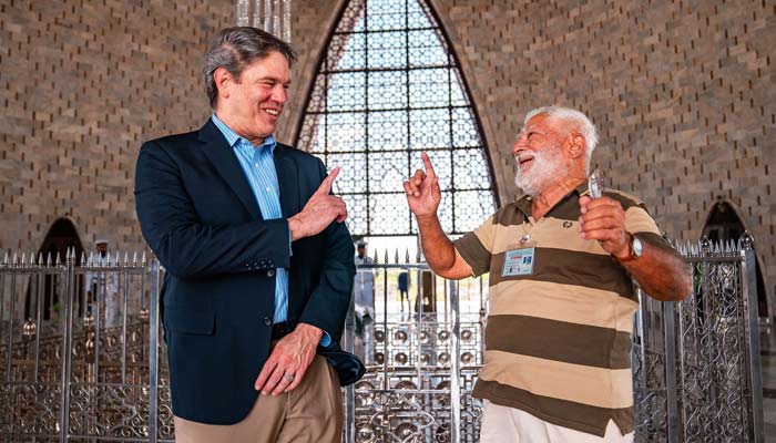 US envoy Andrew Schofer (left) gestures at Mazar-e-Quaid during his Karachi visit. — Supplied