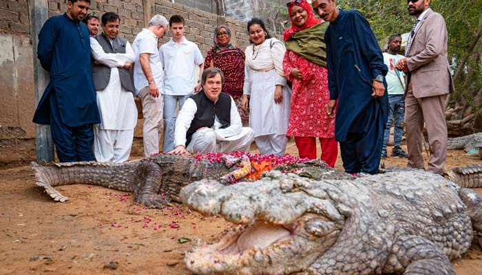 US envoy Andrew Schofer vists the shrine of Manghopir in Karachi. — Supplied