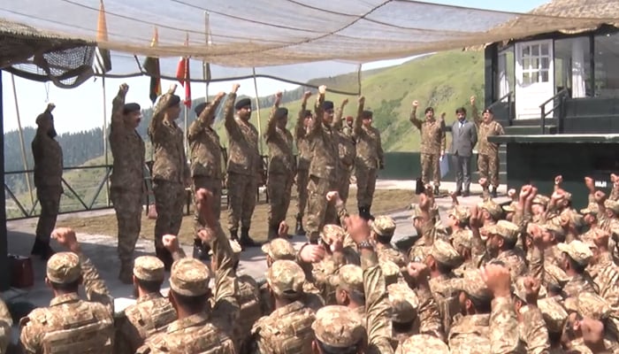 COAS General Asim Munir (centre right) raises slogans along with troops at the Line of Control (LOC) in the Haji Pir sector, on June 17, 2024. — Screengrab/ISPR