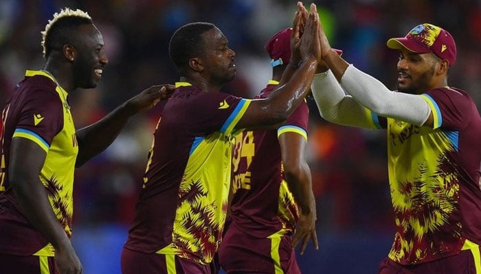 West Indian team celebrates during match against Afghanistan at the Daren Sammy Cricket Ground in Gros Islet, Saint Lucia on June 18, 2024. — X/@Rnawaz31888