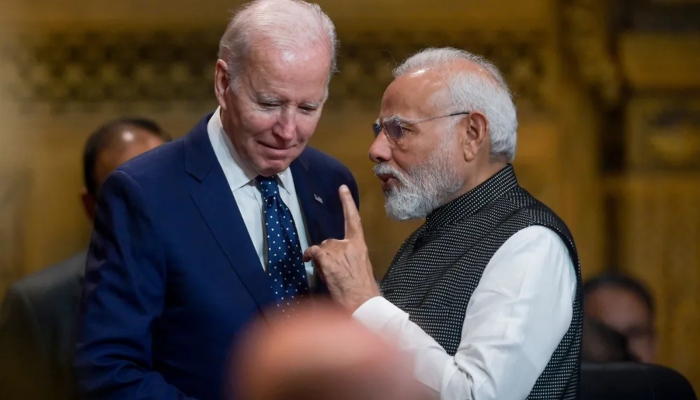 US President Joe Biden talks with Indias Prime Minister Narendra Modi at the opening of the G-20 Summit in Nusa Dua on the Indonesian resort island of Bali on November 15, 2022. —AFP