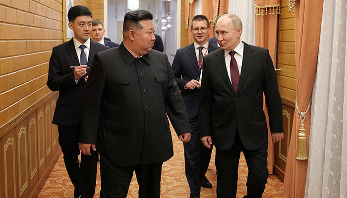 Russian President Vladimir Putin talks with North Korean leader Kim Jong Un during his visit to Pyongyang, North Korea, in this image released by the Korean Central News Agency June 19, 2024. — Reuters