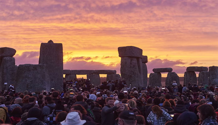 People gathered around the Stonehenge to celebrate Summer Solstice. — AFP/File