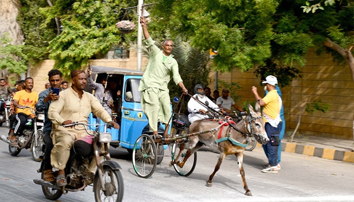 Man takes part in the traditional donkey cart race during Commissioner Karachi Sports Festival on June 23, 2024. — Commissioner of Karachi