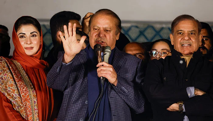 Former PM Nawaz Sharif (centre), flanked by his daughter Maryam Nawaz Sharif (left) and brother Shehbaz Sharif, addresses party workers at Model Town in Lahore, Pakistan, on February 9, 2024. — Reuters