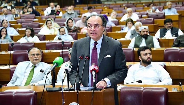 Minister for Finance and Revenue Senator Muhammad Aurangzeb addressing to wind up the Federal Budget 2024-2025 in the National Assembly of Pakistan. —APP