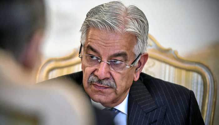 Defence Minister Khawaja Asif gestures during a meeting in this undated photo. —AFP