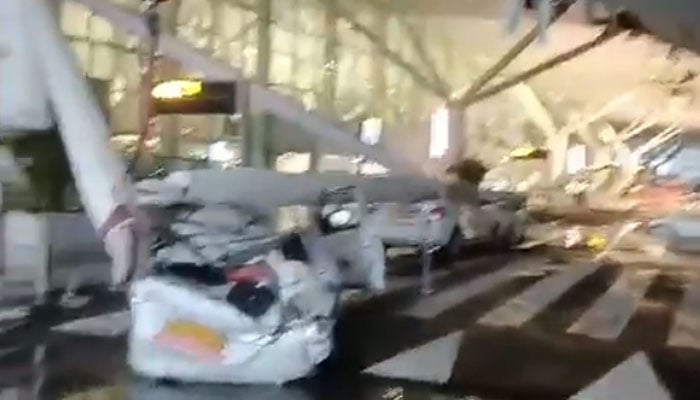A view of cars smashed by the collapsed Delhi airport roof. — Screengrab via X/@ANI