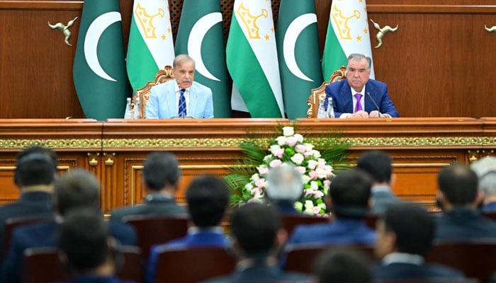 Accompanied by President of Tajikistan Emomali Rahmon, Prime Minister Shehbaz Sharif addresses the press conference at the Qasr-e-Millat, Tajikistans presidential palace, on July 2, 2024. — PID