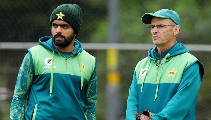 Pakistan captain Babar Azam pictured alongside coach Gary Kirsten during a training session. — AFP/File