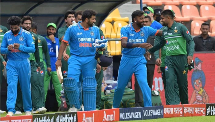 Players of India and Pakistan gesture before the start of the Asia Cup 2023 one-day international (ODI) cricket match between India and Pakistan at the Pallekele International Cricket Stadium in Kandy on September 2, 2023 — AFP