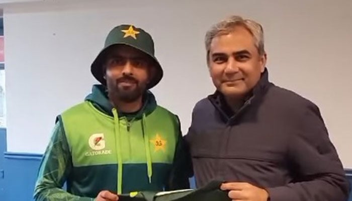 Pakistans skipper Babar Azam shakes hands with PCB Chairman Mohsin Naqvi in this video released on May 13, 2024. — Screengrab via YouTube/@pakistancricket