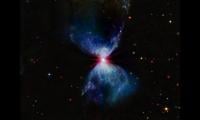 Nasa Releases Image Of Protostar Creating Red, White, Blue Fireworks