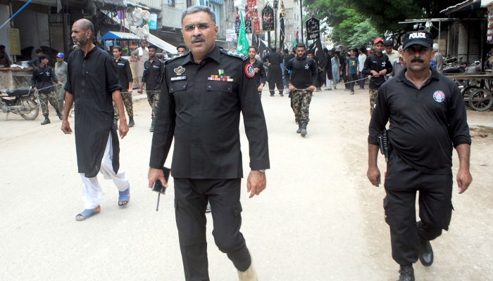 Senior police officers are monitoring the security of the mourning procession on the occasion of 9th Muharram in Hyderabad on August 8, 2022. — NNI