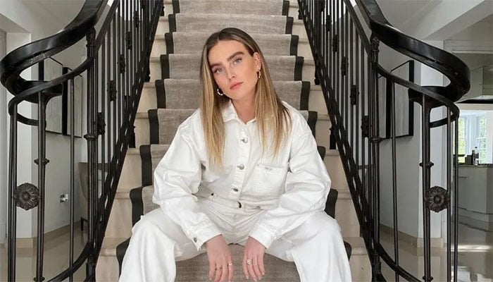 Perrie Edwards solo career faces scrutiny as second single falters in charts.