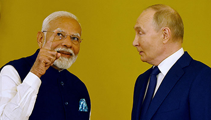 Russias President Vladimir Putin talks to Indias Prime Minister Narendra Modi before awarding him the Order of St. Andrew the Apostle the First-Called at the Kremlin in Moscow, Russia July 9, 2024.— Reuters