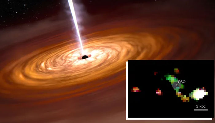 An illustration of a supermassive-black-hole-powered quasar. A map of line emissions of hydrogen (in red and blue) and oxygen (in green), in the PJ308-21 system, shown after masking the light from the central quasar (QSO). — Nasa/Inaf/File