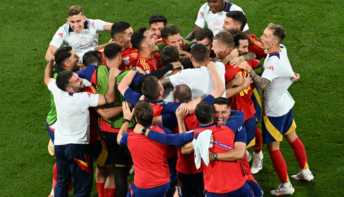 Spain’s players celebrate after winning the UEFA Euro 2024 semi-final football match between Spain and France at the Munich Football Arena in Munich on July 9, 2024. — AFP