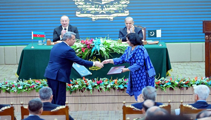 Azerbaijans President Ilham Aliyev and Prime Minister of Pakistan Shehbaz Sharif witnesses the signing of MoUs and agreements in various sectors between the two countries, in Islamabad on July 11, 2024. — PID