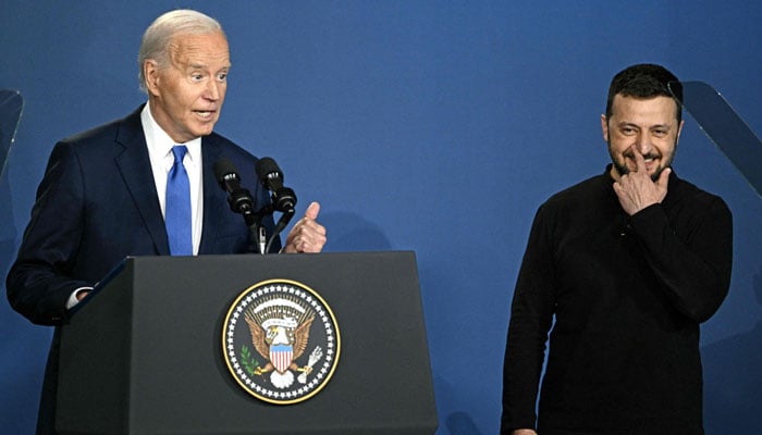 US President Joe Biden corrects himself after accidentally introducing Ukraine’s President Volodymyr Zelensky (right) as Russia’s President Vladimir Putin during the Ukraine Compact initiative on the sidelines of the NATO Summit at the Walter E. Washington Convention Center in Washington, DC, on July 11, 2024. — AFP