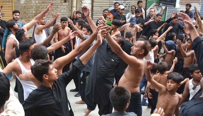 Mourners participating in 9th Muharram procession in Quetta on July 28, 2023. —INP