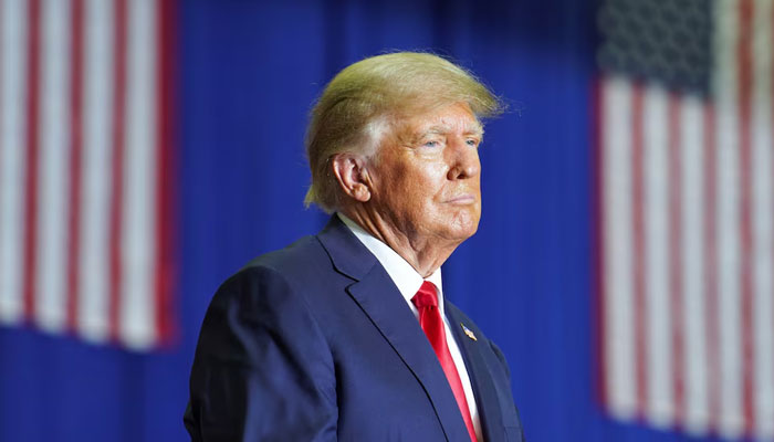 Former US President Donald Trump looks on during a rally in Warren, Michigan, US, October 1, 2022. — Reuters