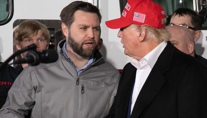 US Senator JD Vance (R) shakes hands with former US president Donald Trump during an event at the East Palestine Fire Department in East Palestine, Ohio, on February 22, 2023. — AFP