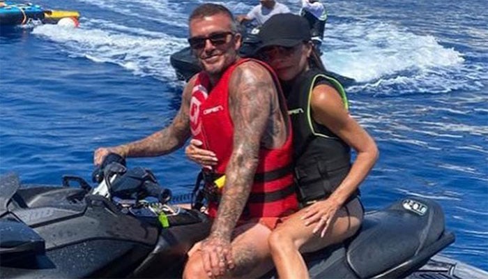 David Beckham flaunts six-pack as Victoria joins him for jet ski adventure