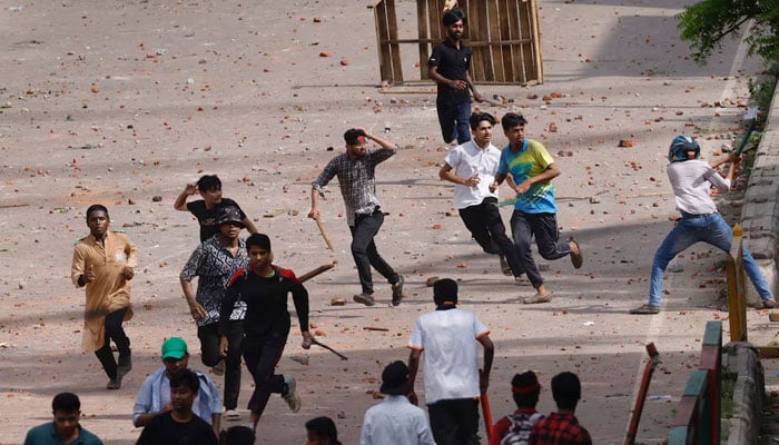 Bangladesh Chhatra League, the student wing of the ruling party Bangladesh Awami League, and anti-quota protesters engage in a clash at the Dhaka College area, in Dhaka, Bangladesh, July 16, 2024. — Reuters