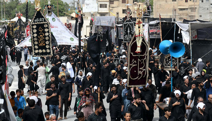 Mourners take part in a procession on the ninth day of Ashura in the Islamic month of Muharram in Karachi on July 16,2024. — Online