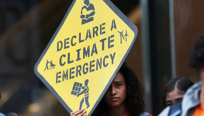 Climate activists protest outside the headquarters of BlackRock in Manhattan in New York City, New York, US, on September 13, 2023. — Reuters