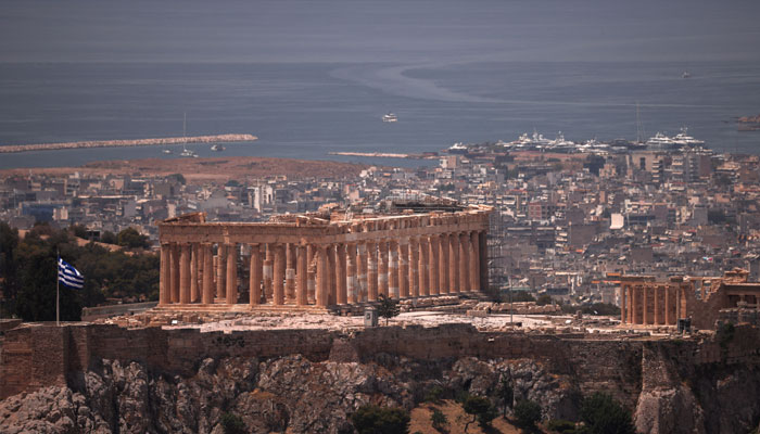 A view of the Parthenon temple as the Acropolis hill archaeological site is closed to visitors due to a heatwave hitting Athens, Greece, June 12, 2024. — Reuters